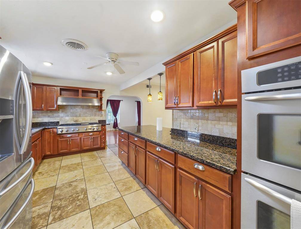 A second view of the kitchen. Notice the double ovens.
