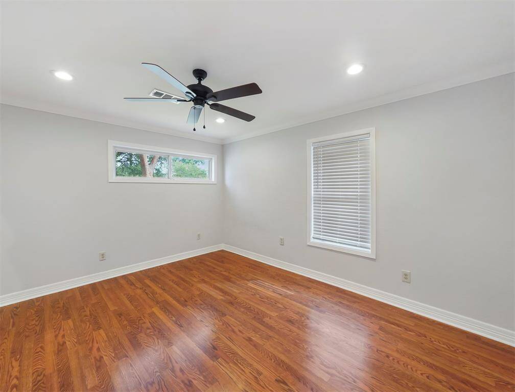 The primary suite is a great retreat, with the premium hardwood floors.