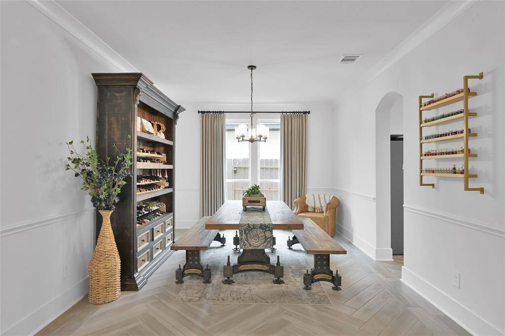 Formal dining area is conveniently located just off of the kitchen.  Carpet was removed by current owner.