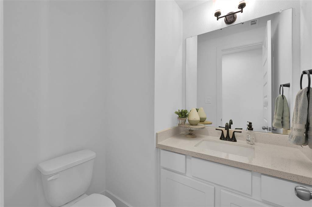 Half bath conveniently located downstairs towards the front of the home.