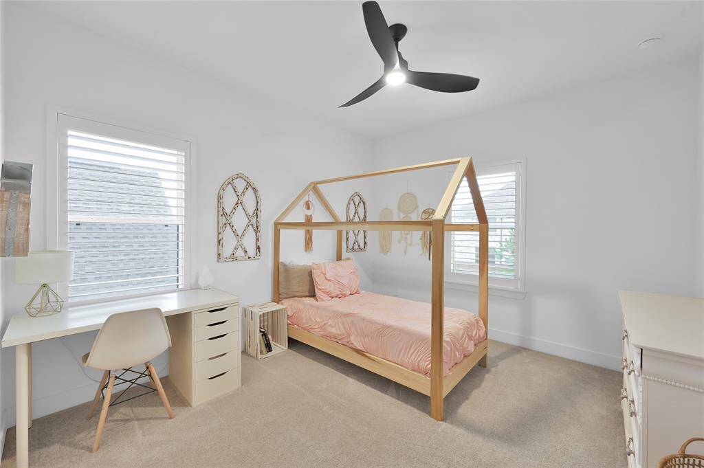 Secondary bedroom #3 is located upstairs and offers a Jack/Jill style bathroom shared with secondary bedroom #4.