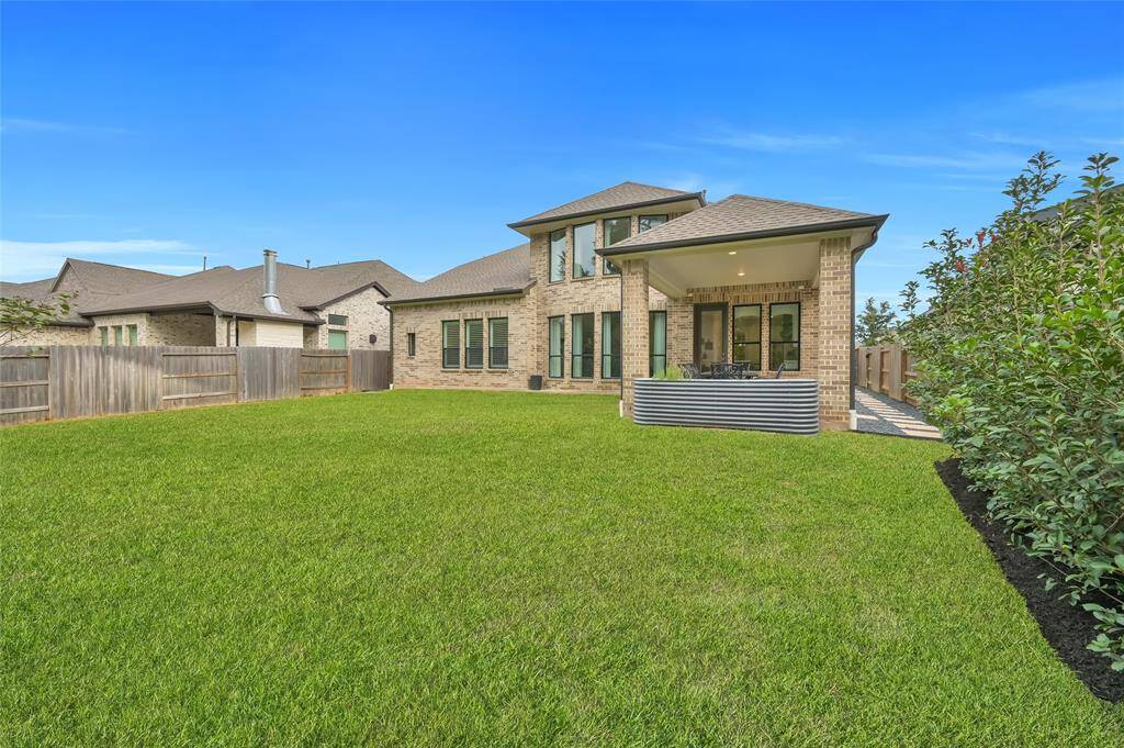 Exterior upgrades include, but are not limited to, an extended covered patio, whole house gutters, underground pipes connected to the gutters for drainage, upgraded landscaping (trees, shrubs, black star rock, pavers, etc), storage shed, and they're all enjoyed with the view of NATURE!  No rear neighbors!