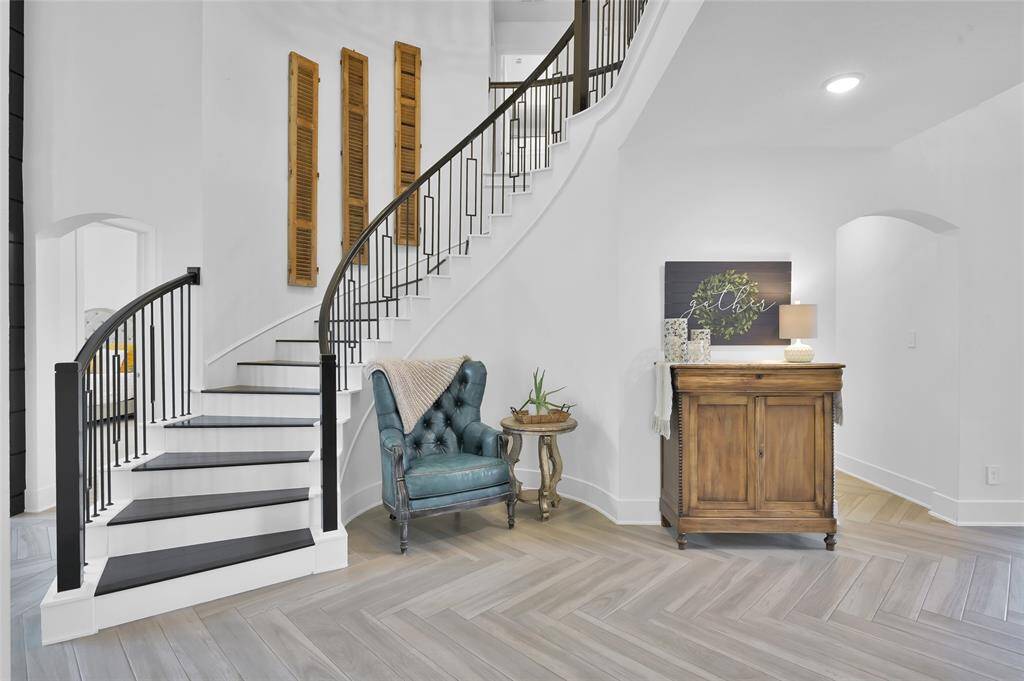 Carpet was removed from stairs, study, dining room, and downstairs living areas!  Primary bedroom is located to the left of the staircase.