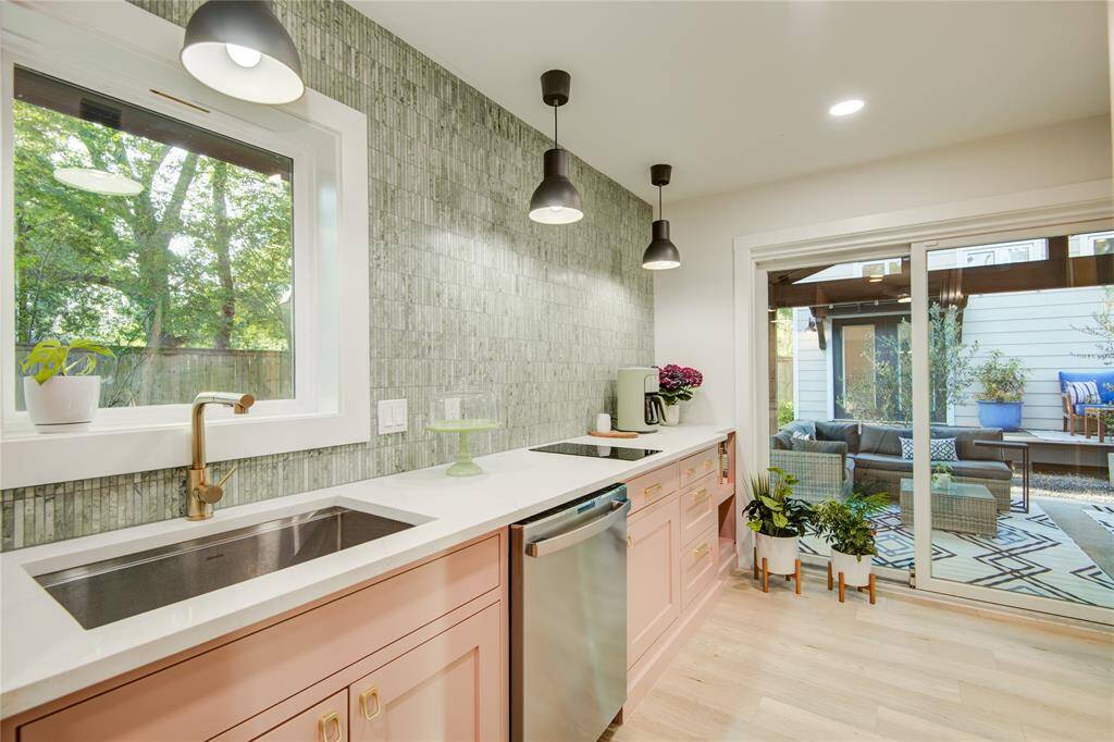 In your hiden Butler's Pantry, you'll find a full-size sink, second dishwasher, two-burner cooktop perfect for when you want to keep a clean kitchen.