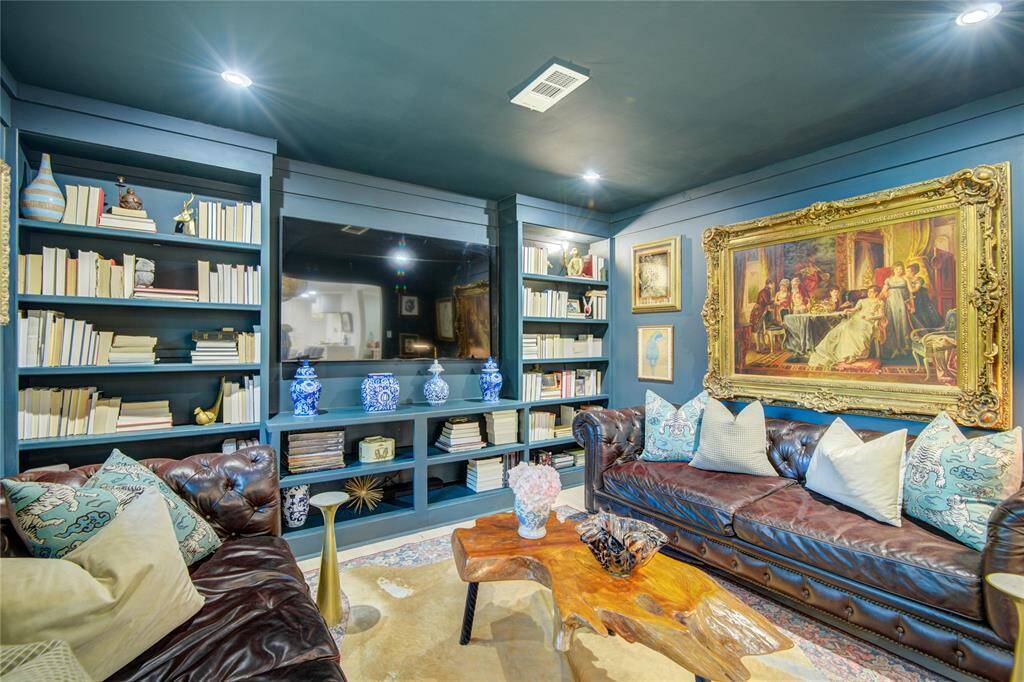 The mood is just right in this lounge for a conversation over a glass of wine, curling up with a good book, or movies on a rainy day. This room was opened up from the third bedroom.