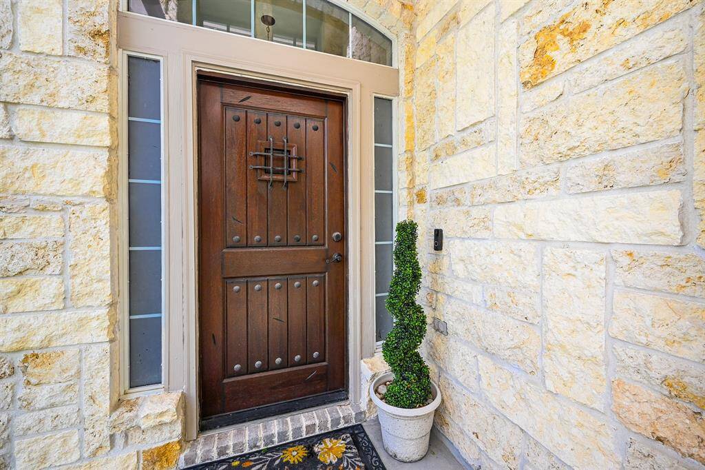 This home delivers unforgettable curb appeal from the moment you arrive.