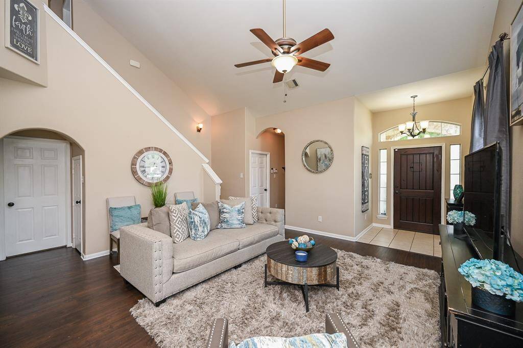 Another view of the living room looking towards the front door.