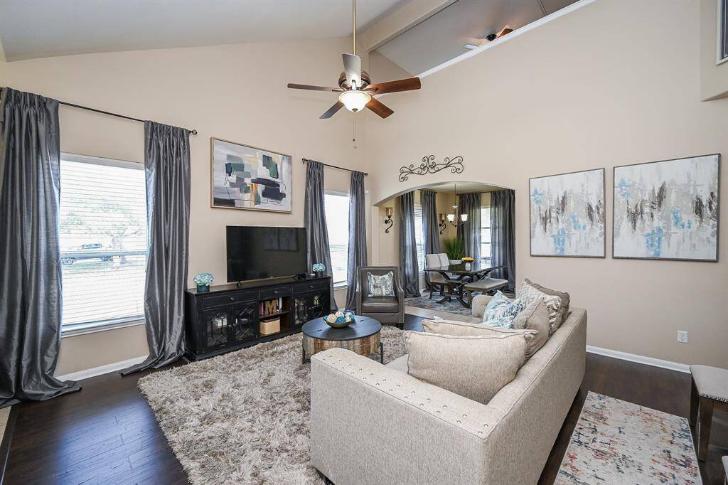 The open floor plan flows effortlessly into the kitchen, creating a seamless connection between living, dining, and cooking spaces—perfect for everyday living and easy entertaining.