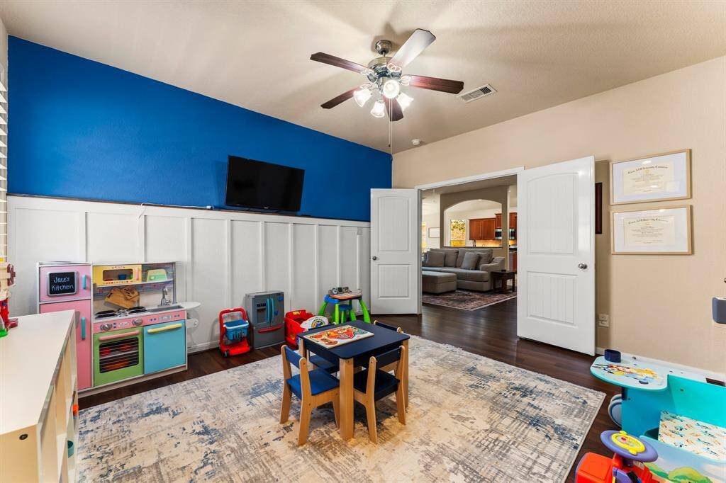 Secondary bedroom (currently a playroom) would function well as a home office study/office with double doors, if needed.