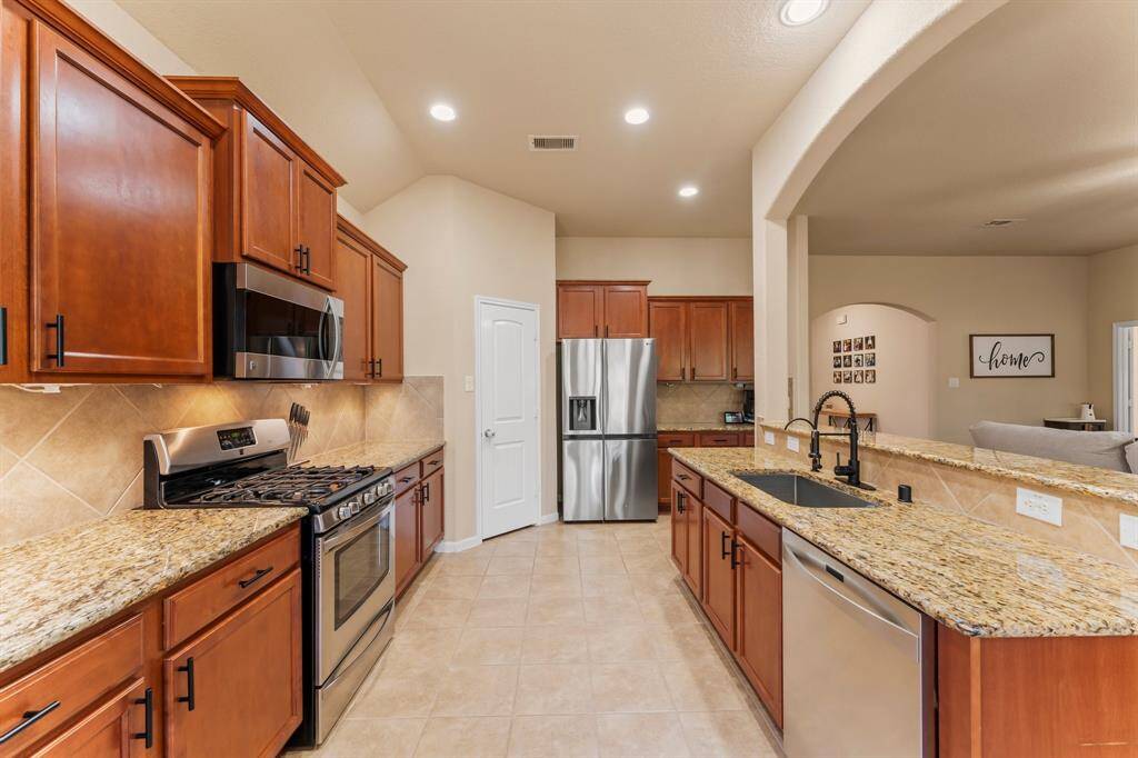 Another view of the kitchen.  Updated sink.