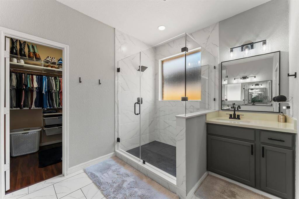 Complete remodel of the primary suite bathroom (countertops, sinks, faucets, hardware).  Oversized shower, new tile and mirrors.