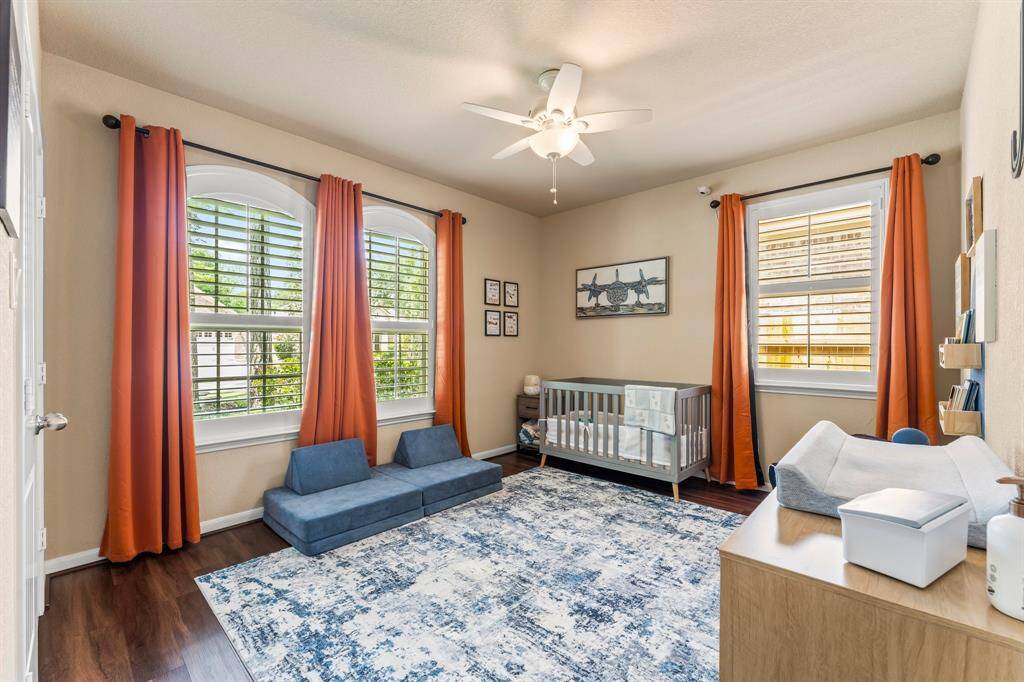 This secondary bedroom is located at the front of the home and has wonderful natural light.