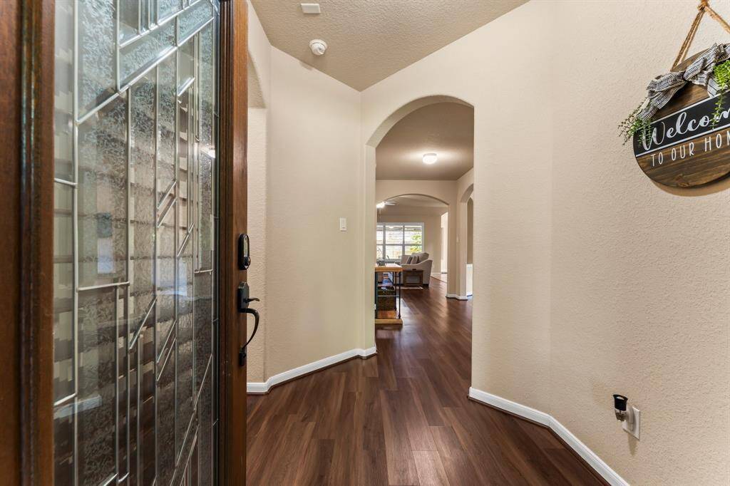 Entry way has view to the backyard. New flooring!
