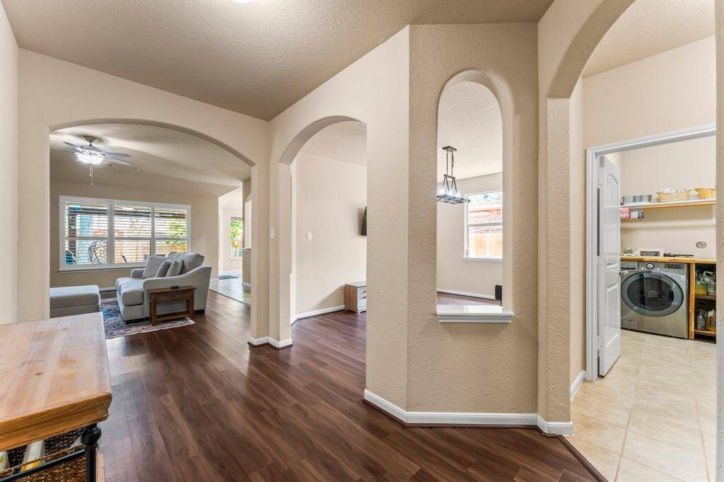 The utility room is conventionally located off of the entry way and by the garage entrance.