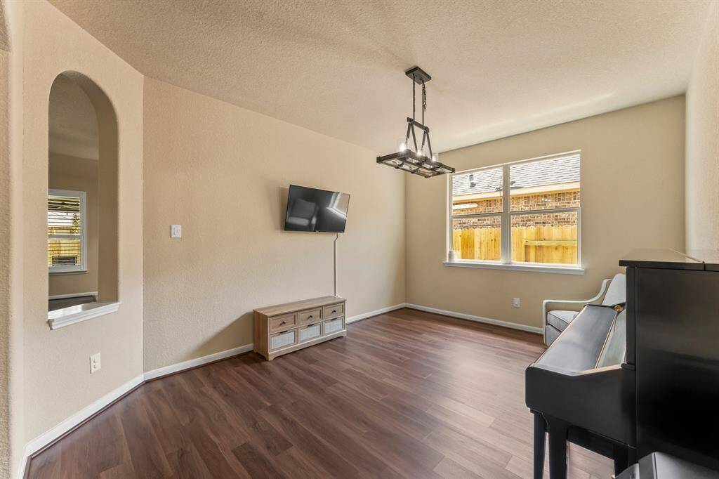 Further down the entry way is the formal dining room (currently used as a flex room).