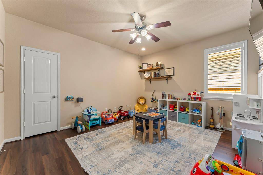 Secondary bedroom off of the family/living room.  Currently being used as a playroom.