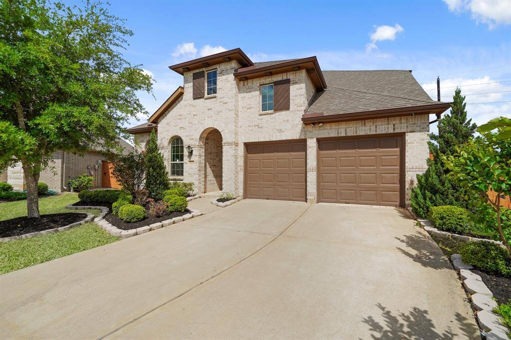 Arrive in Style.From every angle, this home makes a statement. The extended driveway and side view reveal the home’s impressive scale and timeless design. Feel the pride of pulling in every single time.