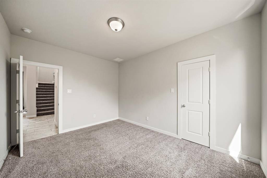 Versatility in Every Corner.This well-sized secondary bedroom downstairs offers flexible space and a welcoming atmosphere. Whether used as a guest room, home office, or cozy retreat, its thoughtful layout enhances comfort and privacy.