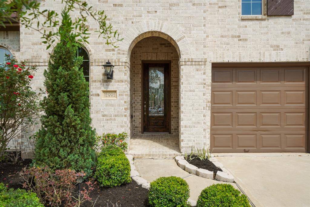 An Entrance That Makes an Impression.The covered walkway draws you in, while the custom front door hints at the elegance within. Step into a home that immediately feels intentional and refined.