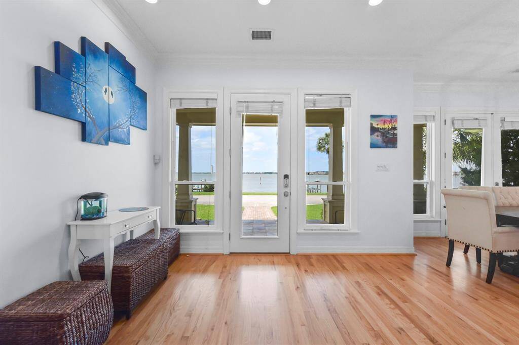As you enter the home, the dining area is to the left that is open to the kitchen.