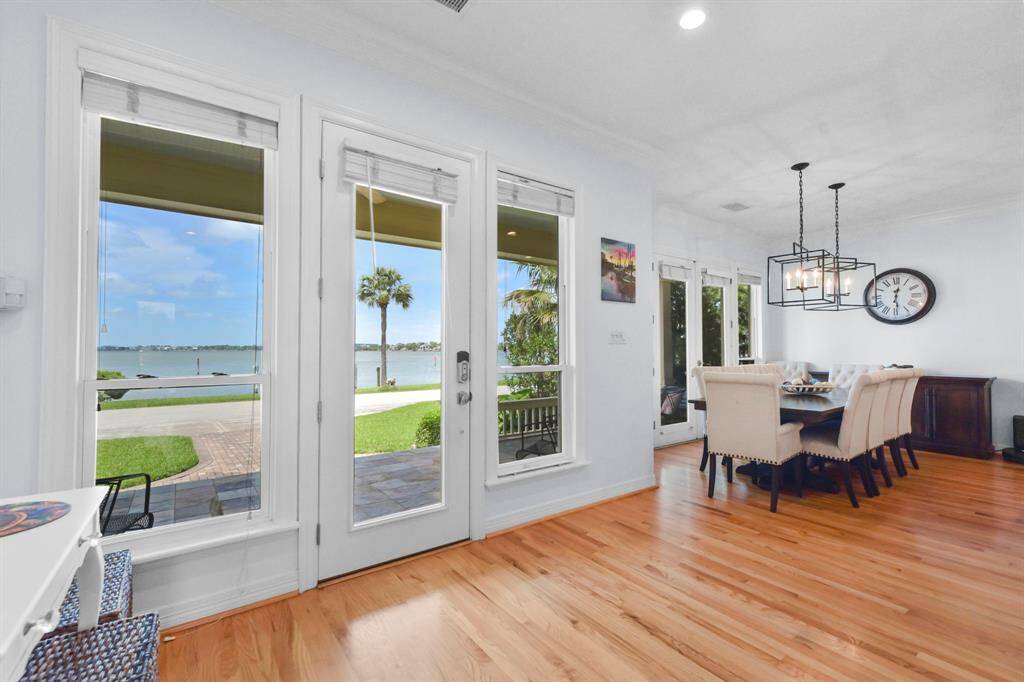 The front of the home offers a wall of windows and a gorgeous view.