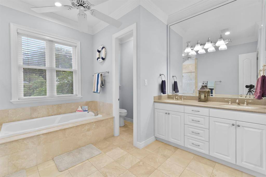 The Primary Bath has double sinks a soaking tub, and walk-in shower.