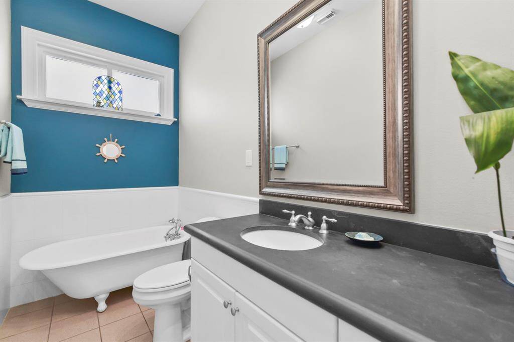 There is a full bath located downstairs and has a claw footed tub.
