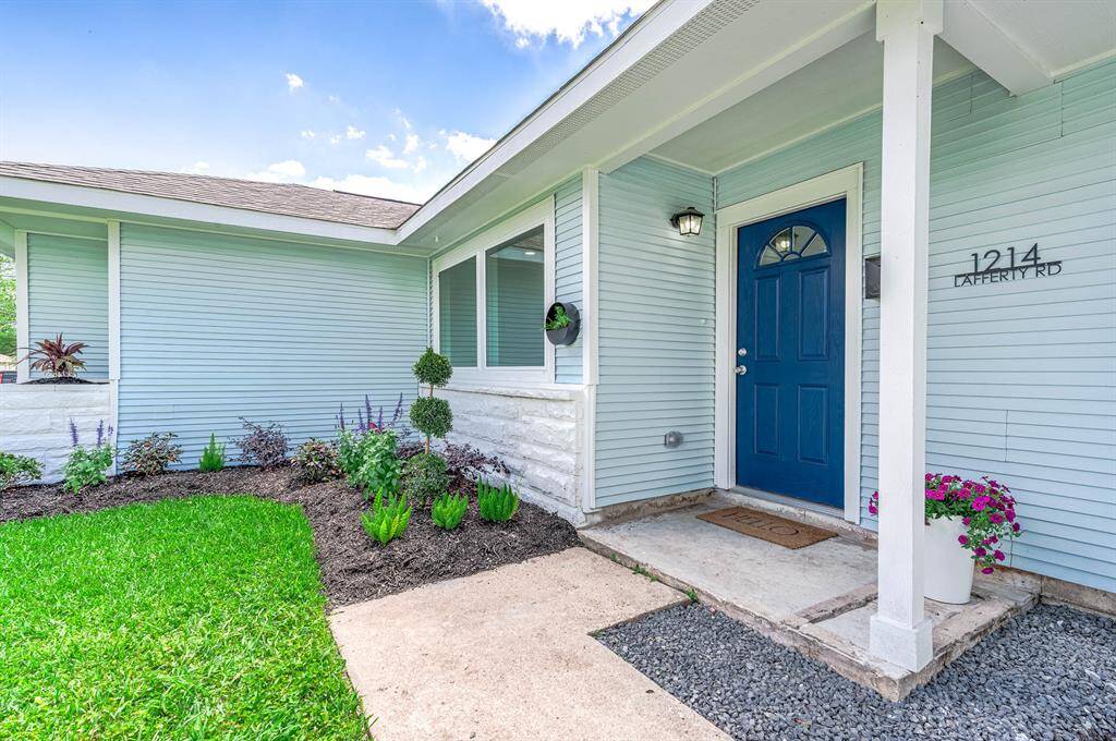 Tastefully done landscaping leading to your new front door.