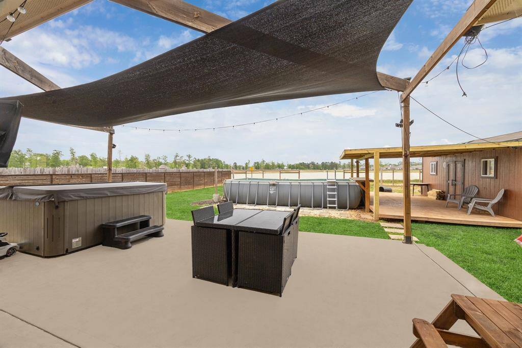 Pool with swim up bar, Pool deck, and spacious shop