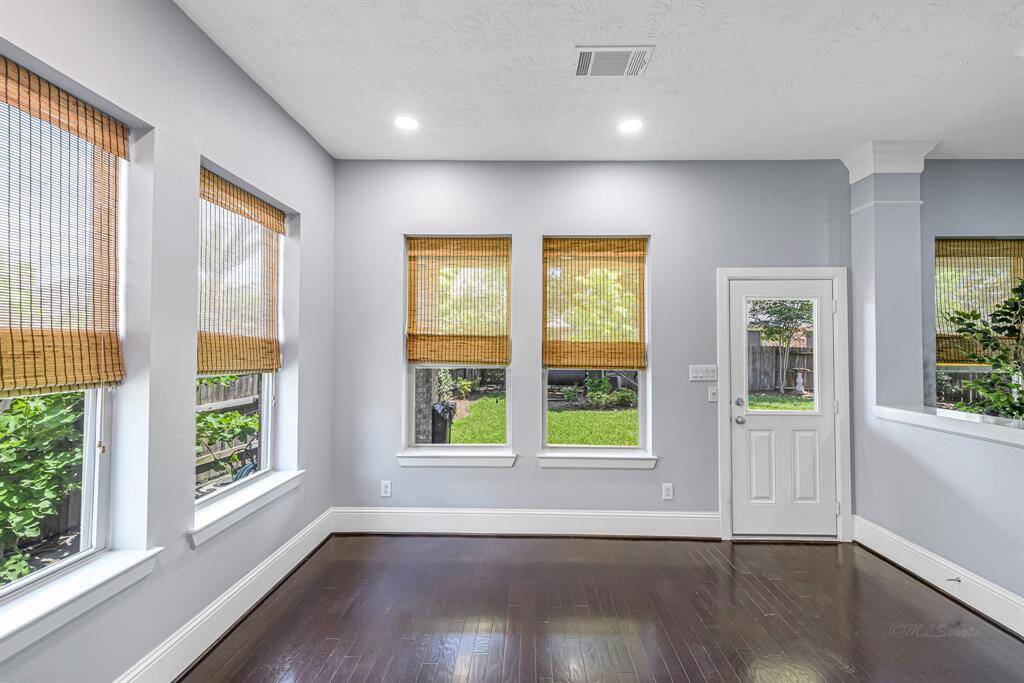 Look how bright this fabulous breakfast room is.