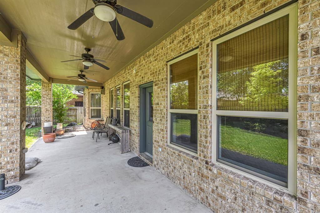 Step outside and enjoy this extended back patio. Also notice the all brick exterior.