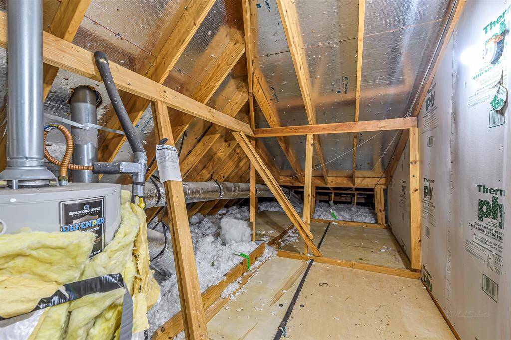 Ample walk-in attic space upstairs off of the bonus room. Additionally, there is a large attic space above the garage accessible by drop stair.