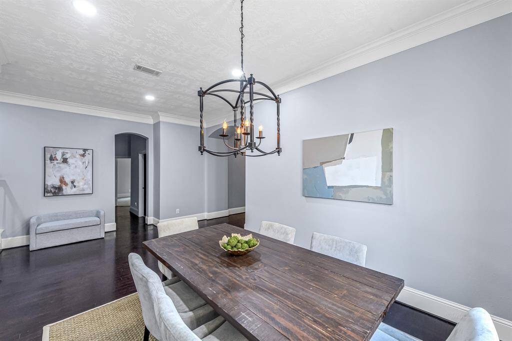 View towards grand entry hall from dining room.