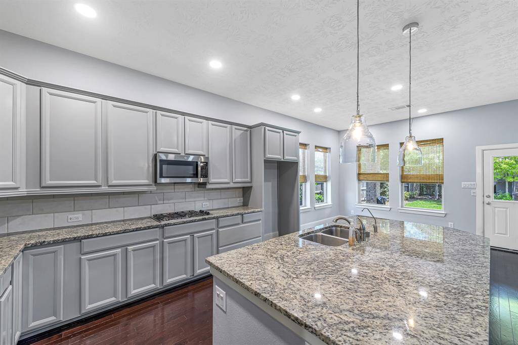 Stepping into the kitchen from the butlers pantry, notice the miles of countertop prep space!