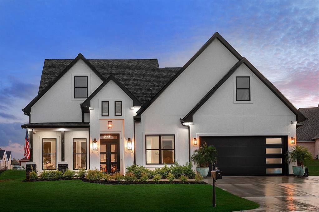 Waterfront, single-story home by EW Unique Custom Homes. Nestled behind the gates of French Quarter, this home has exquisite upgrades throughout! Thoughtfully designed with a 900 square-foot build out on the second floor.