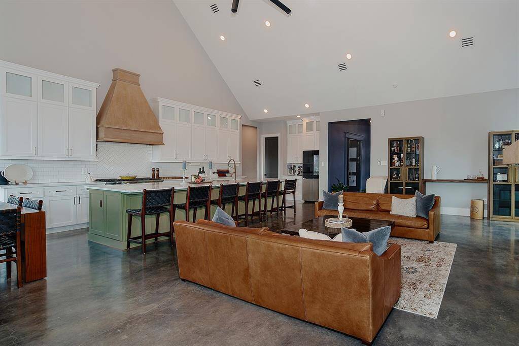 These two rooms are effortlessly tied together with still enough space for functionality.