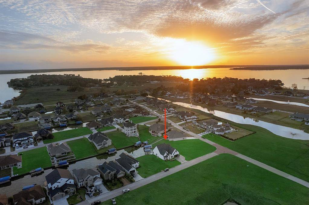 Welcome home to the lake life at 12595 St. Louis Ct!