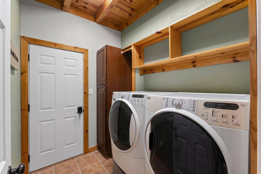 The casita has its own utility room so no need to drag all your clothes to the main home. Door leads into the incredible shop!