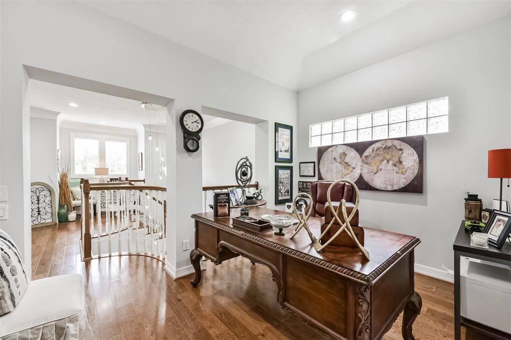 Versatile upstairs area perfect for a home office, offering a quiet and productive space with plenty of natural light.