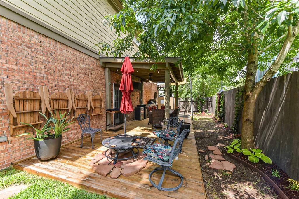 Recently added wood porch that is covered perfect for relaxing outdoors year-around- ideal for coffee, evening unwinding,or entertaining guests.