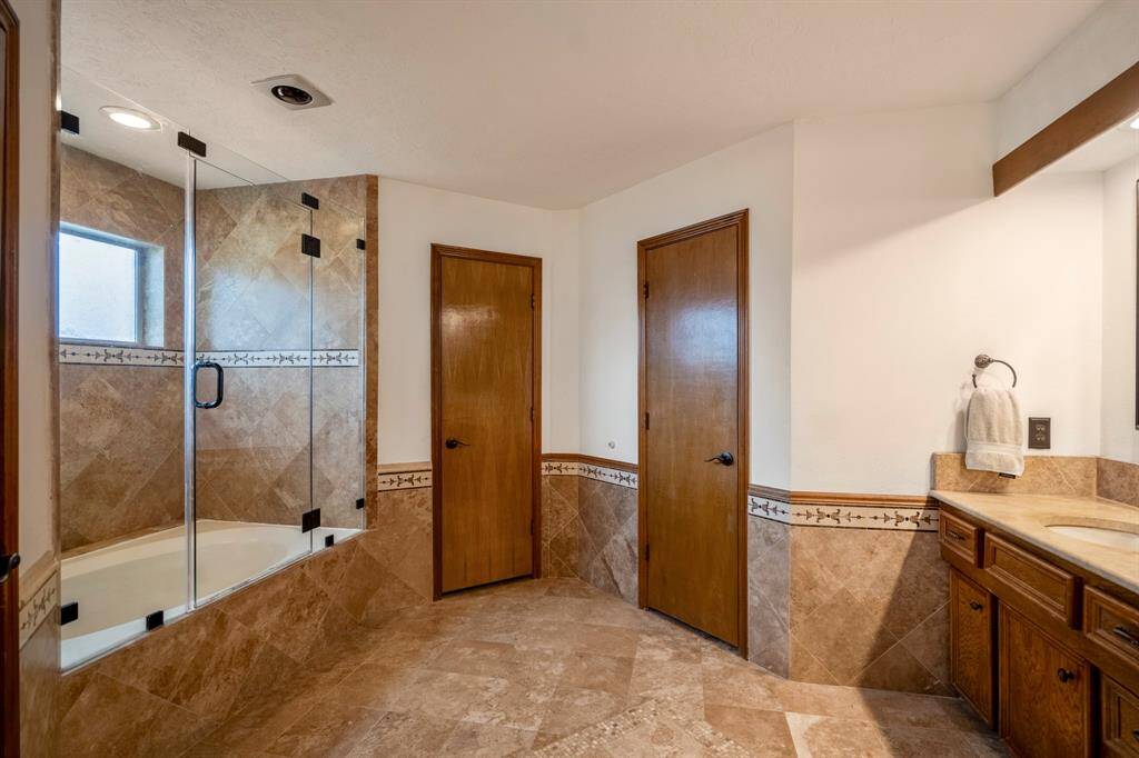 En-Suite Primary Bath with a soaking/garden tub