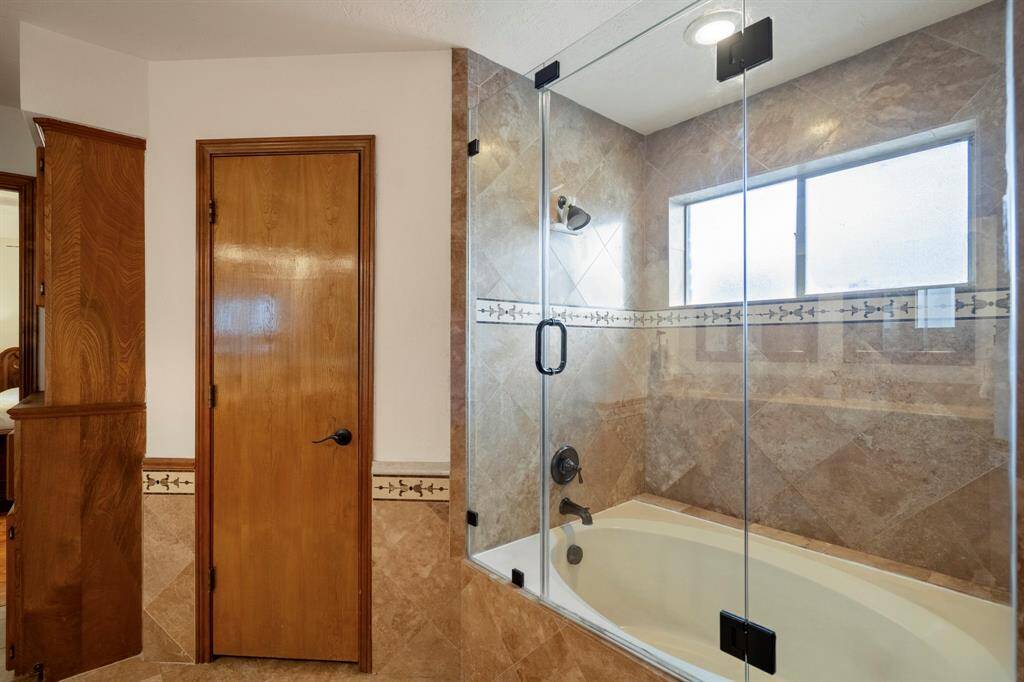 Primary Bath with double closets.