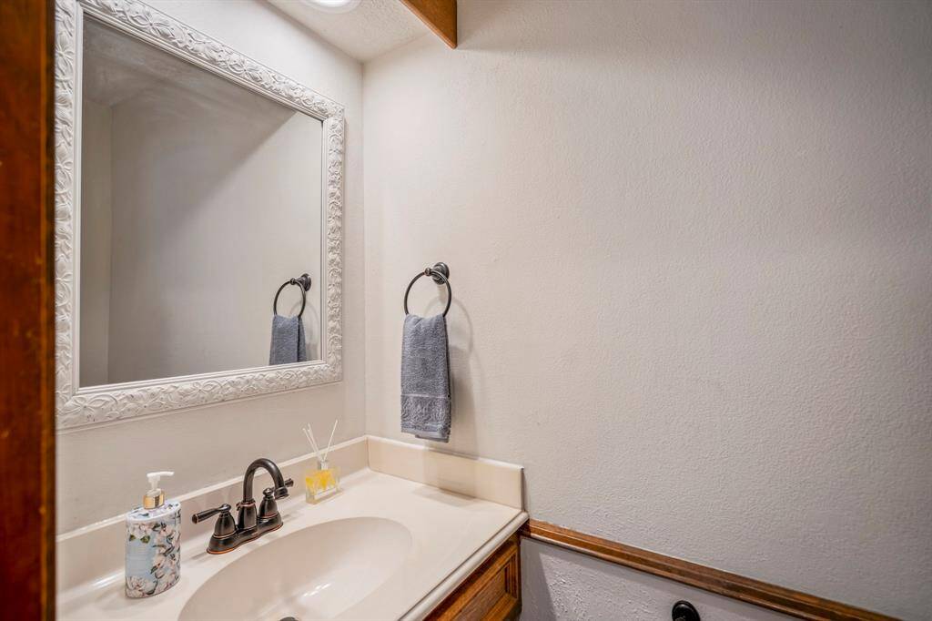 Powder Room on the first floor is perfect for entertaining guests.