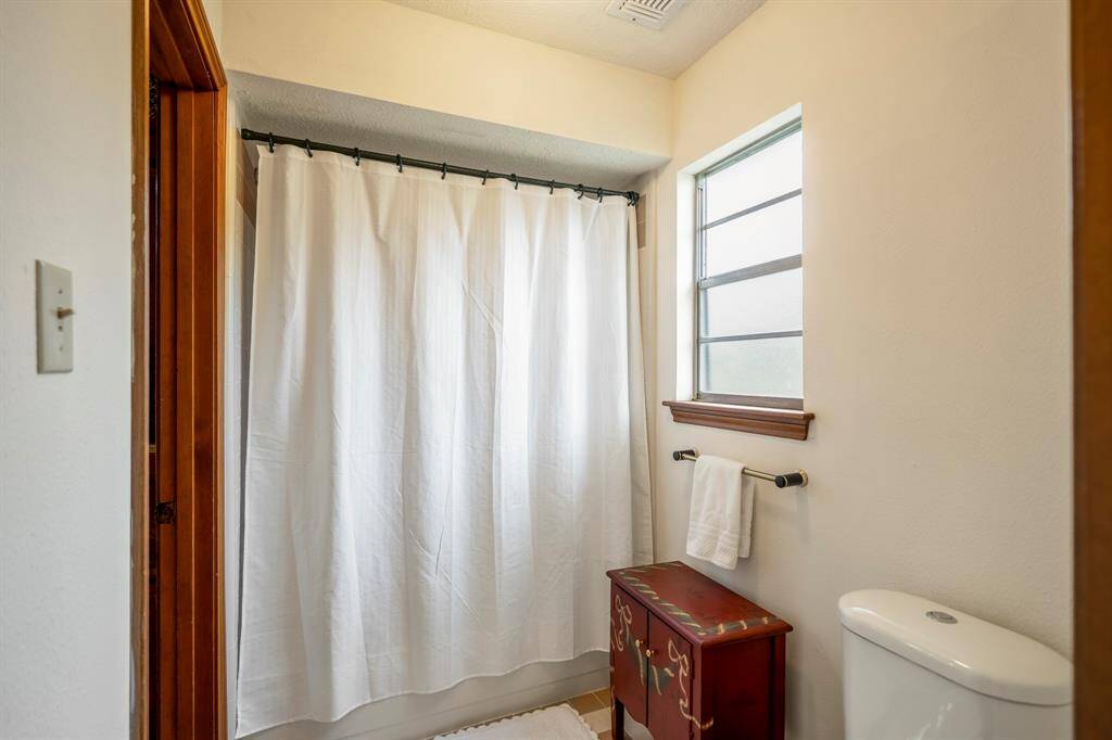 Secondary Bathroom features a tub/shower combination