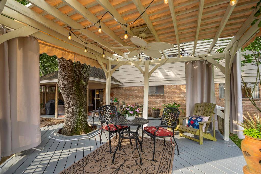 This covered deck seating is the perfect place to unwind.