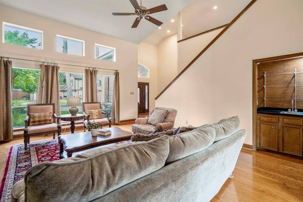 Family Room with high ceilings and tons of natural light.