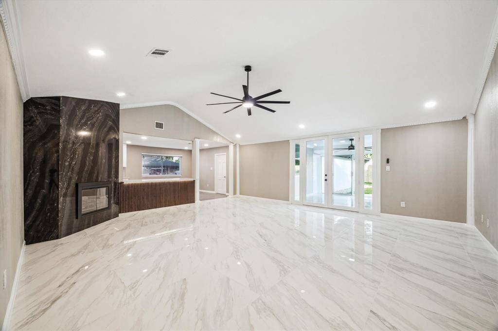 VIEW OF LIVING ROOM FROM ENTRYWAY