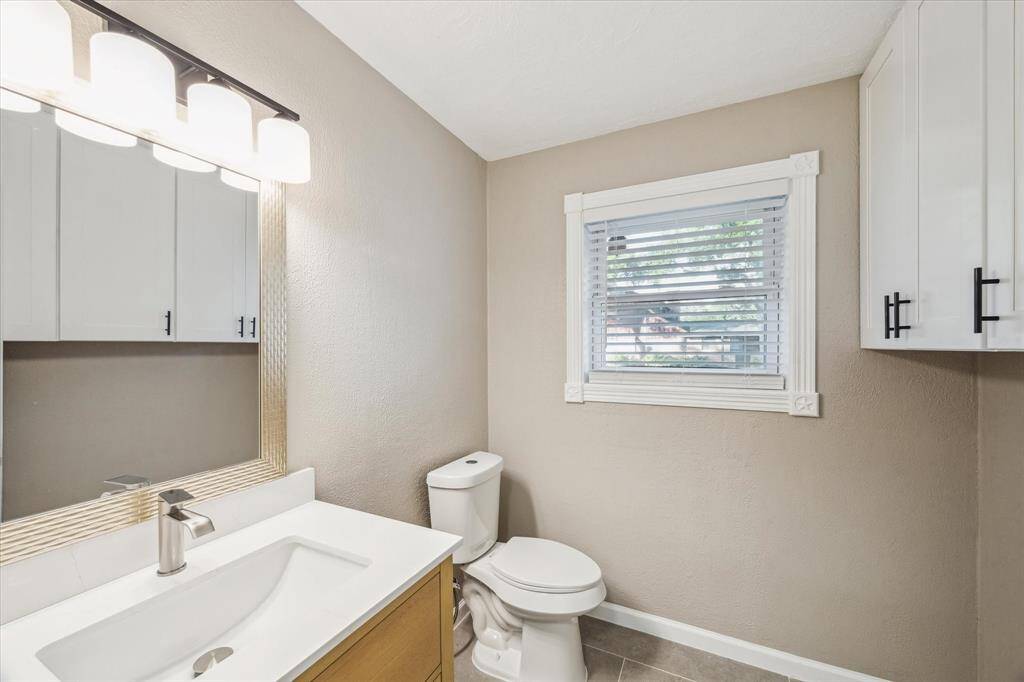HALF BATH BY KITCHEN AND LAUNDRY ROOM
