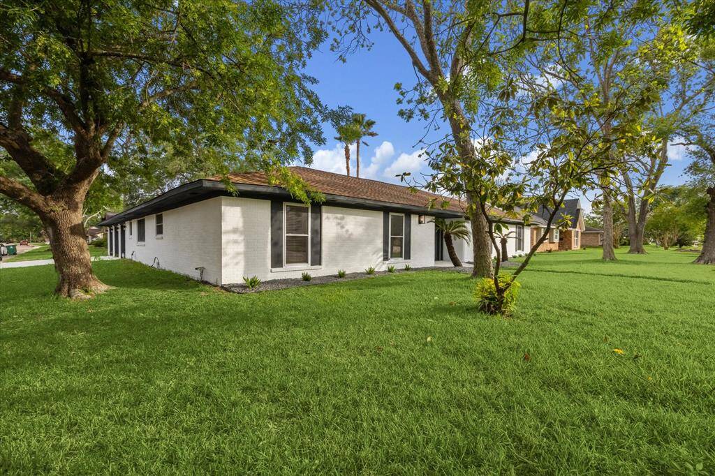 FRONT YARD VIEW OF CORNER LOT