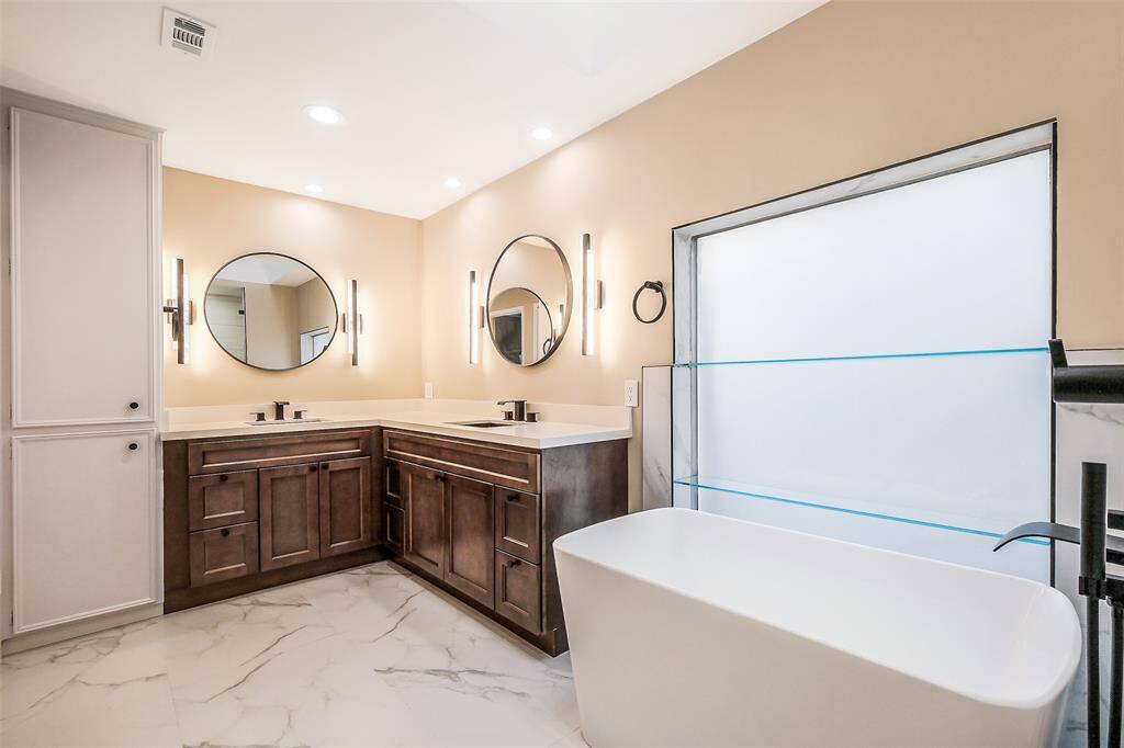 Newly completely renovated and ready for a new family to enjoy. Double vanity, soaking tub and custom shower. Gorgeous!